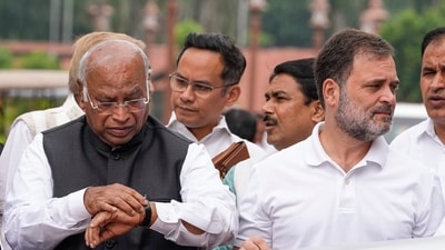 Opposition leaders were seen holding internal discussions as Congress national president Mallikarjun Kharge and Leader of Opposition in the Lok Sabha Rahul Gandhi stood at the forefront of the ‘Stop SIR’ protest. (PTI) Opposition leaders were seen holding internal discussions as Congress national president Mallikarjun Kharge and Leader of Opposition in the Lok Sabha Rahul Gandhi stood at the forefront of the ‘Stop SIR’ protest. (PTI)