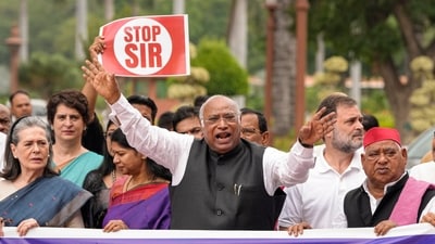 INDIA bloc leaders were seen holding banners of 'Loktantra par vaar', 'Stop SIR' at the protest, sloganeering against the Centre and accusing it of undermining democratic values. (PTI) INDIA bloc leaders were seen holding banners of 'Loktantra par vaar', 'Stop SIR' at the protest, sloganeering against the Centre and accusing it of undermining democratic values. (PTI)