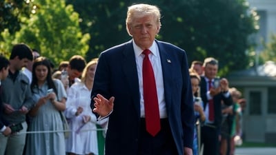 US President Donald Trump walks on the South Lawn of the White House before boarding Marine One in Washington, DC, US, on Friday, July 25, 2025. (Bloomberg) US President Donald Trump walks on the South Lawn of the White House before boarding Marine One in Washington, DC, US, on Friday, July 25, 2025. (Bloomberg)
