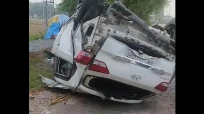 The damaged car in which four people from Rajli village died in Hisar on Sunday night. (HT Photo)