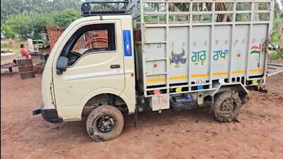The mini-truck that plunged into the canal near Malaud in Ludhiana on Monday. (HT) The mini-truck that plunged into the canal near Malaud in Ludhiana on Monday. (HT)
