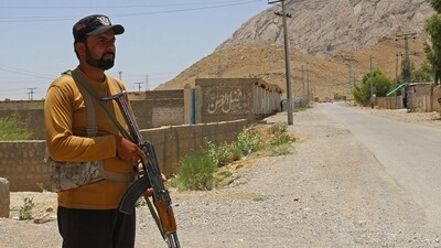 A security personnel stands guard along a street near the site of a school bus bombing in the Khuzdar district of Balochistan province. (AFP/File) A security personnel stands guard along a street near the site of a school bus bombing in the Khuzdar district of Balochistan province. (AFP/File)