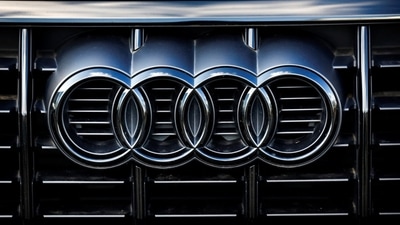 Audi Cuts Guidance as Tariffs and Restructuring Hit Earnings Audi Cuts Guidance as Tariffs and Restructuring Hit Earnings