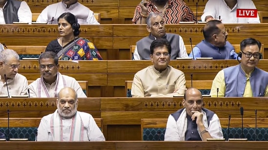 Defence Minister Rajnath Singh with Union Ministers Amit Shah, Nitin Gadkari and others in the Lok Sabha during the Monsoon session of Parliament, in New Delhi, Monday, (Sansad TV Videograb)