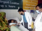 Doctors attending on an injured person after the Barabanki temple stampede on Monday. (PTI PHOTO) Doctors attending on an injured person after the Barabanki temple stampede on Monday. (PTI PHOTO)