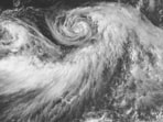 Hurricane Iona is the first named storm of the hurricane season in the central Pacific and emerged Sunday from a tropical depression. It continues to trek west over warm, open waters.