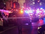 Police work at the scene of a fatal shooting in midtown Manhattan. 