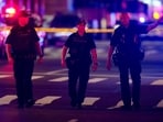 NYPD officers work near the scene of a reported shooter situation in the Manhattan borough of New York City, U.S. July 28, 2025. REUTERS/Eduardo Munoz