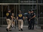New York Police Department (NYPD) officers secure the scene of a shooting from Monday in New York, US, on Tuesday, July 29, 2025. The gunman who killed four people and himself at a Midtown Manhattan tower on Monday was targeting the National Football League�s office, but ended up on the floor of another company by mistake, according to two senior law enforcement officers. Photographer: Victor J. Blue/Bloomberg