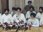 SGPC president Harjinder Singh Dhami with executive members addressing a press conference on Monday. (Sameer Sehgal /HT)