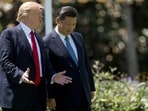 US President Donald Trump (L) and Chinese President Xi Jinping (R) walk together at the Mar-a-Lago estate in Palm Beach, Florida. US President Donald Trump (L) and Chinese President Xi Jinping (R) walk together at the Mar-a-Lago estate in Palm Beach, Florida.
