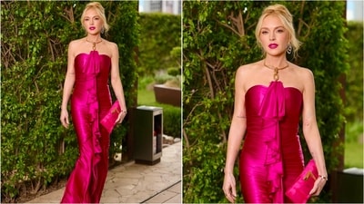 Lindsay Lohan attended the Freakier Friday Mexico City premiere in a bold magenta Balmain gown. Lindsay Lohan attended the Freakier Friday Mexico City premiere in a bold magenta Balmain gown. 