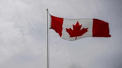 A Canadian flag flies during the Canada Day Celebrations in the Old Port in Montreal, Quebec, on July 1. (AFP) A Canadian flag flies during the Canada Day Celebrations in the Old Port in Montreal, Quebec, on July 1. (AFP)