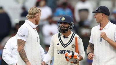 Ben Stokes (L) speaks with Ravindra Jadeja (C) after drawing the match on day five of the fourth cricket test match between England and India at Old Trafford (AFP) Ben Stokes (L) speaks with Ravindra Jadeja (C) after drawing the match on day five of the fourth cricket test match between England and India at Old Trafford (AFP)