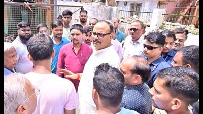 Deputy chief minister Brajesh Pathak during his visit to Shankarpuri Colony in Phool Bagh area on Tuesday.An eight-year-old boy had died after accidentally coming in contact with a high-voltage transformer here on Sunday. (Sourced) Deputy chief minister Brajesh Pathak during his visit to Shankarpuri Colony in Phool Bagh area on Tuesday.An eight-year-old boy had died after accidentally coming in contact with a high-voltage transformer here on Sunday. (Sourced)
