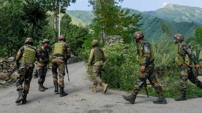 Security personnel during a cordon and search operation, near Dachigam in Srinagar district, Jammu and Kashmir, Monday, July 28, 2025. (PTI) Security personnel during a cordon and search operation, near Dachigam in Srinagar district, Jammu and Kashmir, Monday, July 28, 2025. (PTI)