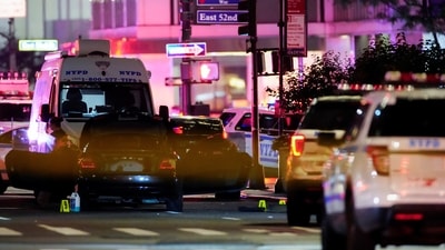 Numbered evidence markers were seen near the scene. (Reuters)