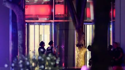 Police officers were seen standing outside the 345 Park Avenue building. (Reuters)