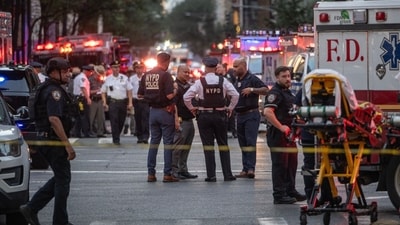An off-duty officer of the New York Police Department (NYPD) was also killed in the shooting, AP reported, citing sources. (Bloomberg) An off-duty officer of the New York Police Department (NYPD) was also killed in the shooting, AP reported, citing sources. (Bloomberg)