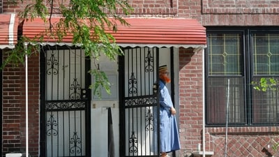 Imam Muhammad Mainul Islam stands outside the home of New York City police officer Didarul Islam, who was shot and killed by a gunman Monday at a Manhattan office building, Tuesday, July 29, 2025, in the Bronx borough of New York.(AP Photo/Seth Wenig) (AP) Imam Muhammad Mainul Islam stands outside the home of New York City police officer Didarul Islam, who was shot and killed by a gunman Monday at a Manhattan office building, Tuesday, July 29, 2025, in the Bronx borough of New York.(AP Photo/Seth Wenig) (AP)