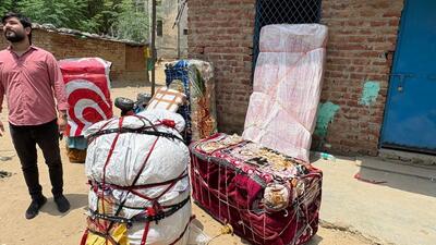 Over the past week, nearly 1,000 families of Bengali-speaking migrant workers have packed up and left Gurugram in hired trucks and buses. (HT Photo) Over the past week, nearly 1,000 families of Bengali-speaking migrant workers have packed up and left Gurugram in hired trucks and buses. (HT Photo)