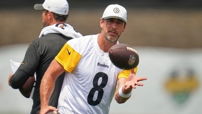 The Steelers acquire Aaron Rodgers, creating excitement for a Super Bowl run. Yet, Mike Florio questions their chances, placing them 12th among teams.  (AP Photo/Gene J. Puskar) (AP)