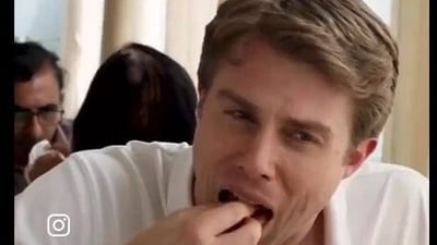 Bret Muller, the CEO of California Burrito enjoys Jolada Rotti meals in Bengaluru ((Screengrab from Bengaluru Servd video)) Bret Muller, the CEO of California Burrito enjoys Jolada Rotti meals in Bengaluru ((Screengrab from Bengaluru Servd video))