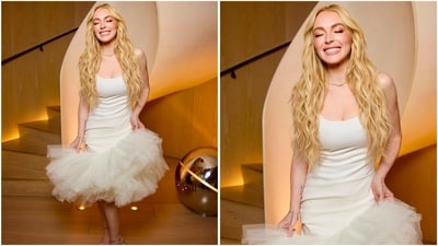 Lindsay stepped out in a crisp white Jacquemus La Robe dress featuring a fitted bodice and playful ruffled hem for premiere in New York City. Lindsay stepped out in a crisp white Jacquemus La Robe dress featuring a fitted bodice and playful ruffled hem for premiere in New York City.