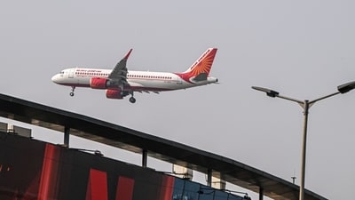 An Airbus A320 aircraft, operated by Air India Ltd, prepares to land at Indira Gandhi International Airport in New Delhi