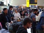 Passengers wait at Heathrow Airport, after radar failure led to the suspension of outbound flights across the UK, in Hounslow, London, Britain, July 30, 2025. 