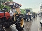 Farmers taking out a tractor march in Sangrur on a rainy Wednesday morning in response to the call given by the Samyukt Kisan Morcha to protest the AAP government’s land-pooling policy. (HT Photo) Farmers taking out a tractor march in Sangrur on a rainy Wednesday morning in response to the call given by the Samyukt Kisan Morcha to protest the AAP government’s land-pooling policy. (HT Photo)
