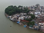 Flood water in localities near Sangam and Dashashwamedh Ghat in Prayagraj on Wednesday. (Anil Kumar Maurya/HT)