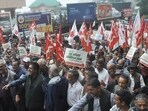 Himachal Pradesh Kisan Sabha and other apple grower organisations during protest outside the Himachal Pradesh secretariat, in Shimla, on Tuesday. (Deepak Sansta/HT)