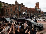 Large crowds gathered at Black Sabbath Bridge as the funeral cortege of Ozzy Osbourne passed through his hometown, in Birmingham, Britain,(REUTERS)