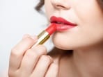 Lipstick contains some compounds that may make your lips appear dark. Lipstick contains some compounds that may make your lips appear dark.
