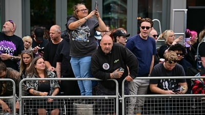 One dedicated fan standing out in the crowd wearing a Black Sabbath t-shirt, standing atop a beer barrel; a fitting farewell for “Ozzy the beer thief”. (Ben STANSALL/AFP) One dedicated fan standing out in the crowd wearing a Black Sabbath t-shirt, standing atop a beer barrel; a fitting farewell for “Ozzy the beer thief”. (Ben STANSALL/AFP)
