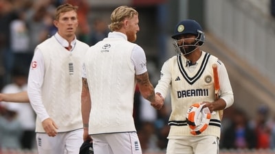 Ben Stokes finally shakes hands with Ravindra Jadeja after a contentious end to the Manchester Test. (Action Images via Reuters)
