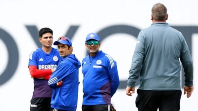 India head coach Gautam Gambhir and Shubman Gill look on as groundkeeper Lee Fortis walks towards them during practice (Action Images via Reuters)
