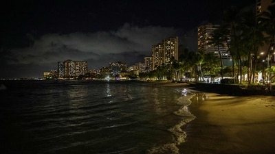 Waves roll on to an empty Waikiki Beach on July 29, 2025 in Honolulu, Hawaii. (Getty Images via AFP) Waves roll on to an empty Waikiki Beach on July 29, 2025 in Honolulu, Hawaii. (Getty Images via AFP)