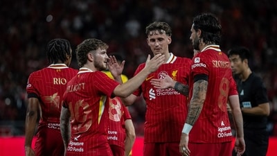 Liverpool players celebrate a goal during their preseason friendly vs AC Milan in Hong Kong. (AP)