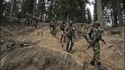 Indian soldiers trek back after a search operation around Baisaran meadow, a day after an attack on tourists in Pahalgam, on April 23, 2025. (AFP) Indian soldiers trek back after a search operation around Baisaran meadow, a day after an attack on tourists in Pahalgam, on April 23, 2025. (AFP)