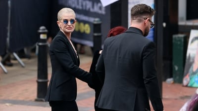 Kelly Osbourne, accompanies mother, Sharon and brother, Jack Osbourne during their father's funeral. The late rockstar died “surrounded by love” on July 22, ending his long battle with Parkinson's disorder. (Jack Taylor/REUTERS)