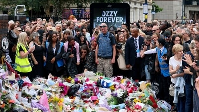 Fans assemble to pay their respects to the “Crazy Train” singer at the Black Sabbath Bridge. Ozzy Osbourne's chaotic brilliance and his unmistakable rasp of a voice, not only gave Black Sabbath mythic status but also redefined the very foundations of hard rock and heavy metal. (Jack Taylor/REUTERS)