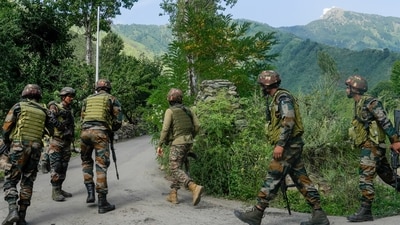 Security personnel during a cordon and search operation, near Dachigam in Srinagar district, Jammu and Kashmir, Monday, July 28, 2025. (PTI) Security personnel during a cordon and search operation, near Dachigam in Srinagar district, Jammu and Kashmir, Monday, July 28, 2025. (PTI)