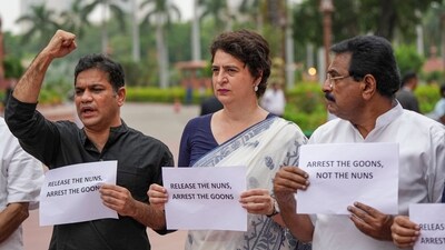Priyanka Gandhi and other Congress MPs staged a protest near the Makar Dwar of the Parliament. (PTI) Priyanka Gandhi and other Congress MPs staged a protest near the Makar Dwar of the Parliament. (PTI)