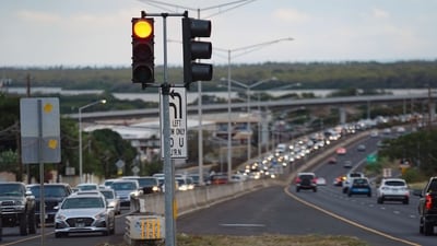 Oahu residents evacuate Ewa Beach due to the threat of tsunami in Kapolei, Oahu, Hawaii. (AP) Oahu residents evacuate Ewa Beach due to the threat of tsunami in Kapolei, Oahu, Hawaii. (AP)