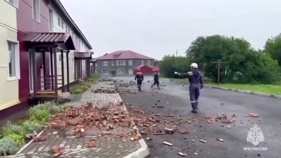 This video grab from a handout footage released by Russia's Emergencies Ministry on July 30, 2025, shows emergency service specialists inspecting a damaged building following an earthquake on far eastern Sakhalin Island. One of the strongest earthquakes ever recorded struck Russia's sparsely populated Far East early on July 30, causing tsunamis of up to four metres (12 feet) across the Pacific and sparking evacuations from Hawaii to Japan. (Photo by Handout / Russian Emergencies Ministry / AFP) (AFP) This video grab from a handout footage released by Russia's Emergencies Ministry on July 30, 2025, shows emergency service specialists inspecting a damaged building following an earthquake on far eastern Sakhalin Island. One of the strongest earthquakes ever recorded struck Russia's sparsely populated Far East early on July 30, causing tsunamis of up to four metres (12 feet) across the Pacific and sparking evacuations from Hawaii to Japan. (Photo by Handout / Russian Emergencies Ministry / AFP) (AFP)