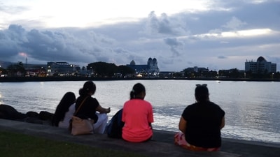  Residents watch the ocean in Samoa's capital city of Apia on July 30, 2025, as a tsunami warning is in effect. (AFP) Residents watch the ocean in Samoa's capital city of Apia on July 30, 2025, as a tsunami warning is in effect. (AFP)