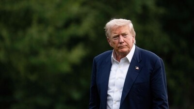 US President Donald Trump arrives on the South Lawn of the White House in Washington, DC, on July 29, 2025. (AFP) US President Donald Trump arrives on the South Lawn of the White House in Washington, DC, on July 29, 2025. (AFP)