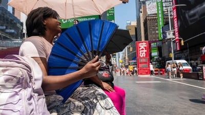 Temperatures are expected to reach into the high 90s with a heat index well above 100 degrees. (Photo by SPENCER PLATT / GETTY IMAGES NORTH AMERICA / Getty Images via AFP) (Getty Images via AFP) Temperatures are expected to reach into the high 90s with a heat index well above 100 degrees. (Photo by SPENCER PLATT / GETTY IMAGES NORTH AMERICA / Getty Images via AFP) (Getty Images via AFP)